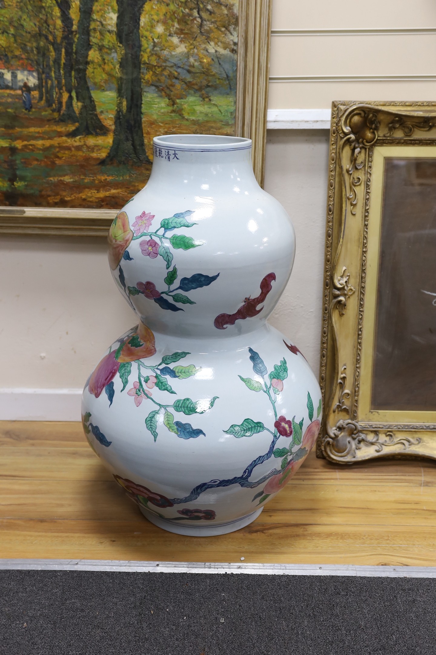 A massive Chinese enamelled porcelain double gourd vase - 84cm tall